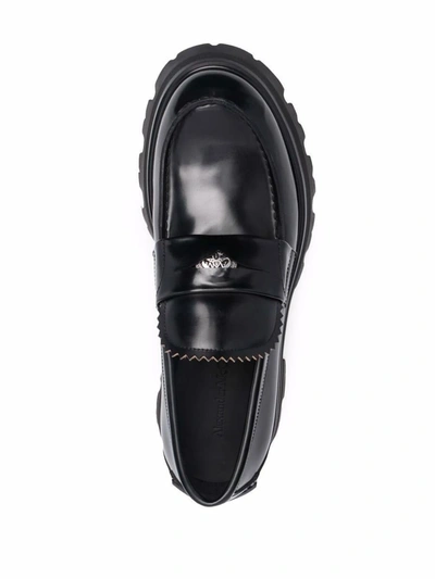 Shop Alexander Mcqueen Penny Slot Loafers In Black