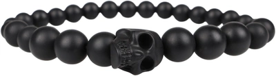 Shop Alexander Mcqueen Skull Bracelet In Black