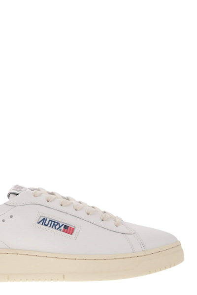 Shop Autry Dallas - Leather Sneakers In White