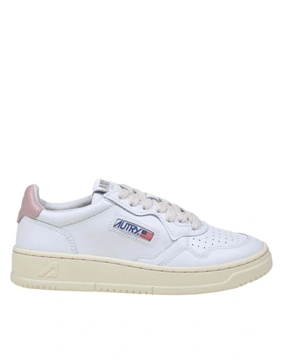 Shop Autry Leather Sneakers In White/pink