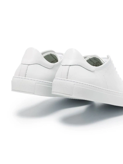 Shop Axel Arigato - Low Top Sneakers In White