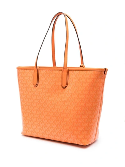 Shop Michael Michael Kors Big Orange Tote Bag With All-over Monogram And Logo Charm In Faux Leather Woman