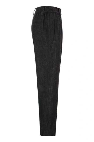 Shop Brunello Cucinelli Baggy Trousers In Dark Polished Denim In Black