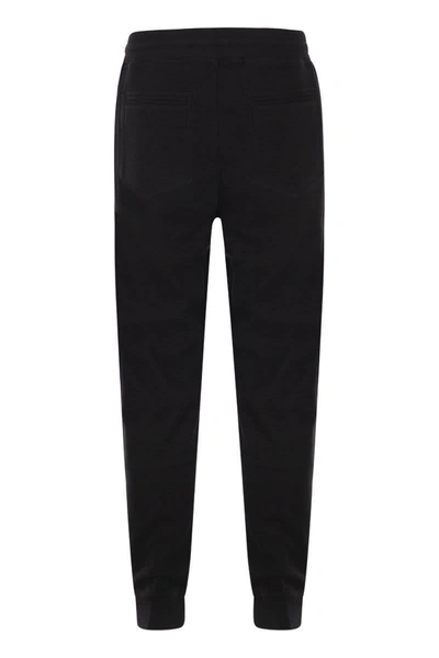 Shop Brunello Cucinelli Techno Cotton Fleece Trousers With Elasticated Hem In Black
