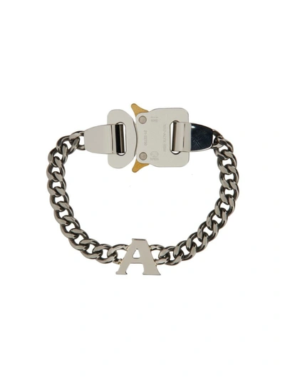 Shop Alyx 1017  9sm Buckle Bracelet With Charm In Silver
