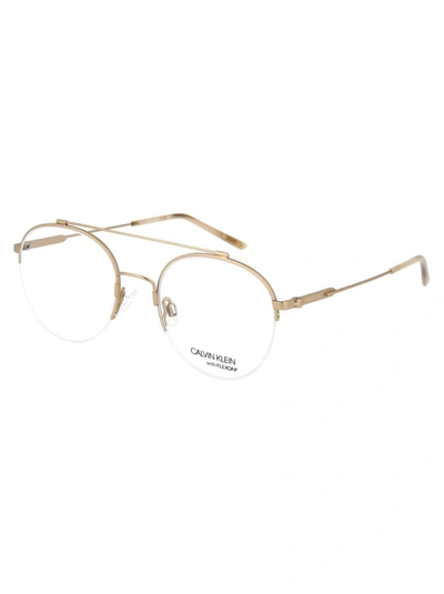 Calvin Klein Satin Silver Metal Optical Glasses In 716 Satin Light Gold
