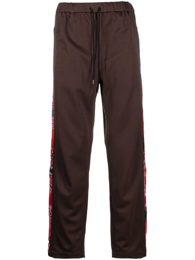 Shop Children Of The Discordance Printed Bandana Trousers In Brown