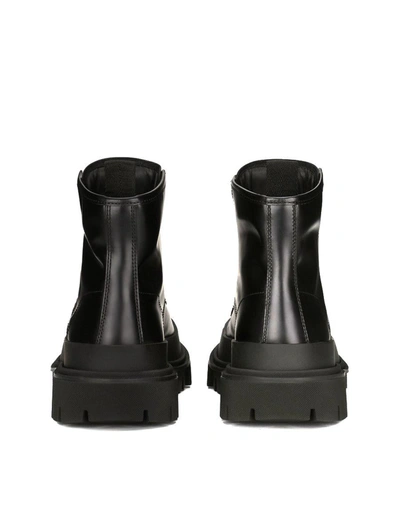 Dolce & Gabbana Studded Calfskin Hi-trekking Ankle Boots In Black