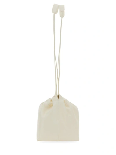 Shop Jil Sander Dumpling Bag. In Ivory