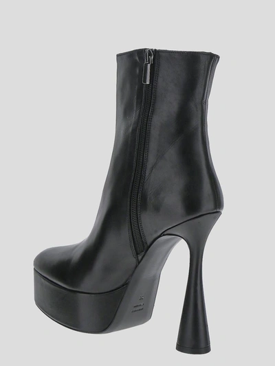 Shop Eddy Daniele Ankle Boots In <p> Black Ankle Boots In Leather With Wedge