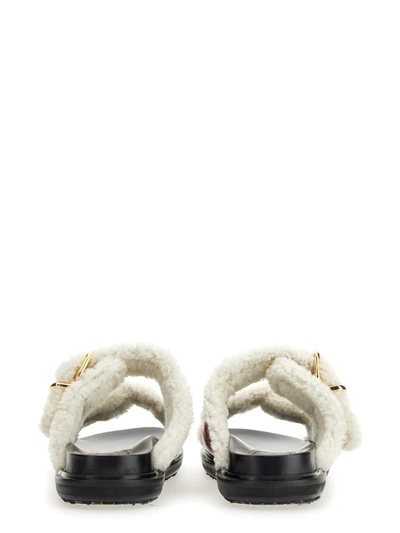 Marni Gold-tone Buckle Shearling Slides In Yellow