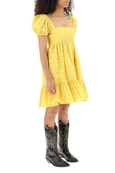 Shop Ganni Broderie Mini Dress In Yellow