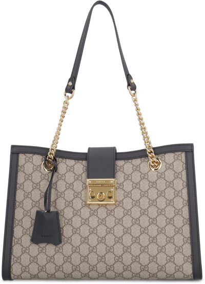 Shop the Padlock Gucci Signature medium shoulder bag by Gucci. A structured  shoulder bag with a strap that secures with …