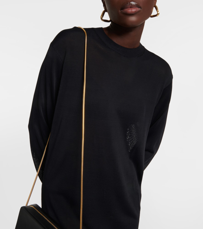 Khaite Paley Long-sleeve Fringe Backless Maxi Dress In Blue