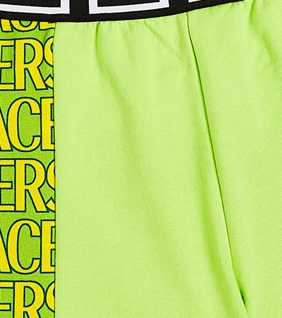 Shop Versace Allover Cotton Jersey Shorts In Green