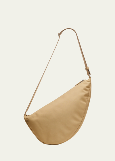 Shop The Row Slouchy Banana Two Sling Bag In Dune Pld