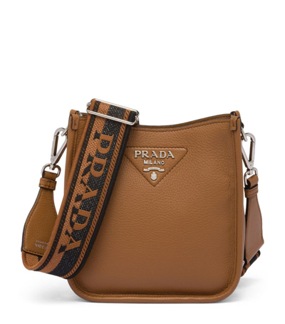 Shop Prada Mini Leather Cross-body Bag In Brown