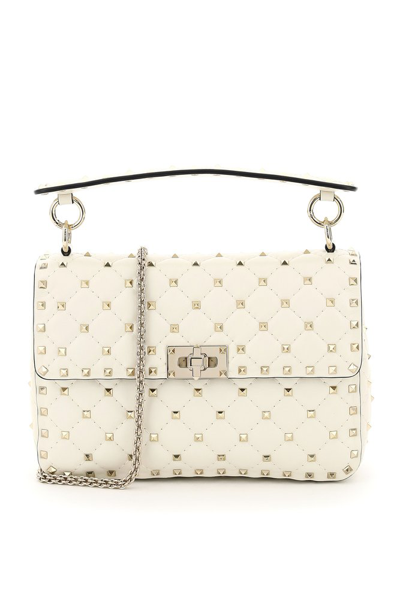 Shop Valentino Garavani Rockstud Spike Foldover Top Shoulder Bag In White