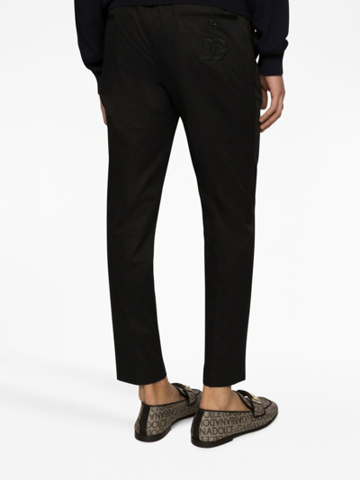 Shop Dolce & Gabbana Logo-embossed Tailored Trousers In Black