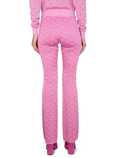 Shop Versace Jacquard Pants With Greek Print In Pink