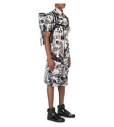 Shop Ktz Newspaper-print Cotton Cargo Shorts In Beige/black