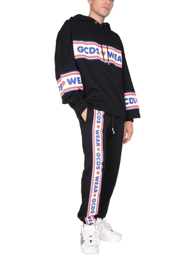 Shop Gcds Jogging Pants With "cute Tape" Logo Band In Black