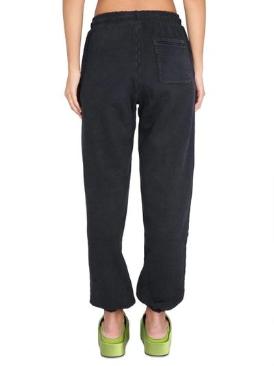 Versace Jogging Pants With Logo In Black