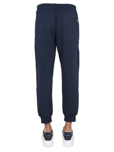 Shop Alexander Mcqueen Jogging Pants With Selvedge Logo Band In Blue