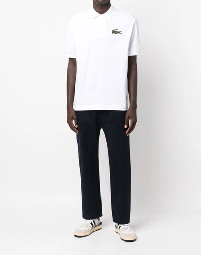Shop Lacoste Loose Fit Logo Polo Shirt In White