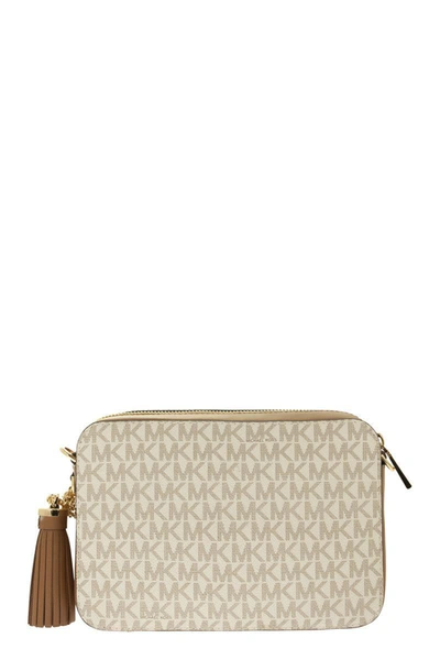 Shop Michael Kors Ginny - Medium Logo Crossbody Bag In Vanilla