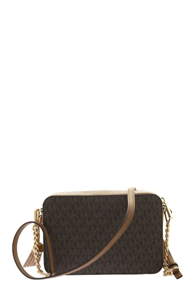 Shop Michael Kors Ginny - Medium Logo Crossbody Bag In Brown