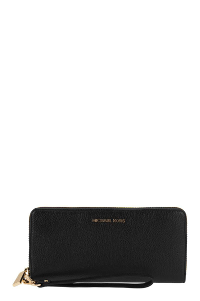Shop Michael Kors Jet Set - Grained Leather Wallet In Black