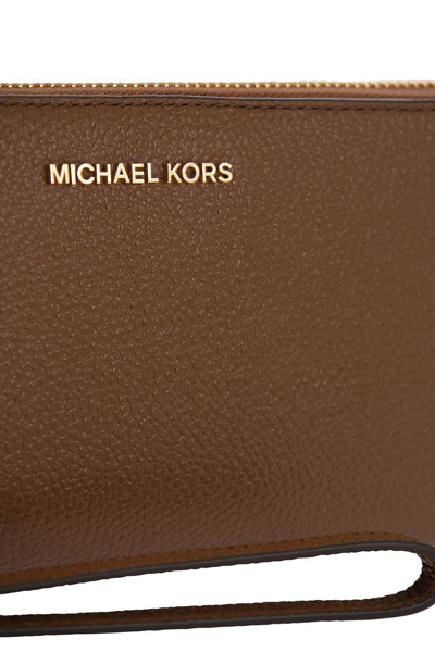 Shop Michael Kors Jet Set - Grained Leather Wallet In Brown