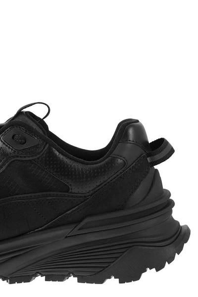 Shop Moncler Lite Runner Sneaker In Black