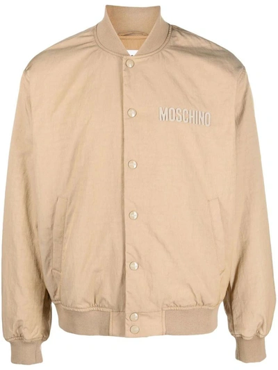 Shop Moschino Couture Outerwear In Beige