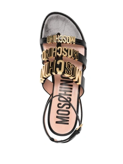 Shop Moschino Couture Sandals In Black