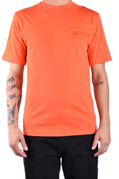 Shop Moschino T-shirts In Orange