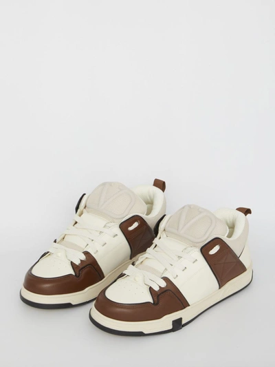 Valentino Open Skate Leather Sneakers In <p>open Skate Sneakers Crafted From Calfskin In The Shades Of Ivory, Brown And Black With Padded Fab