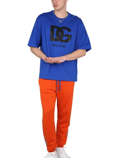 Shop Dolce & Gabbana Pants With Logoed Band In Orange
