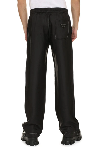 Shop Prada Silk Trousers In Black