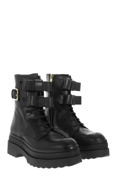 Shop Red Valentino Combat Boot With Bows In Black