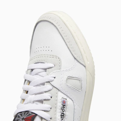 Shop Reebok Lt Court Sneakers In White
