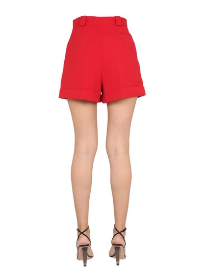 Shop Moschino Shorts With Pockets In Red