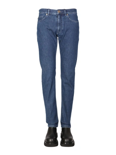 Shop Versace Slim Fit Jeans In Blue