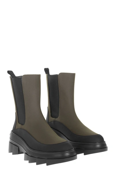 Stuart Weitzman Chelsea Boots With Lug Sole And Pull Tab In Black/green
