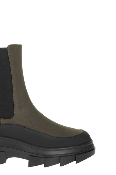 Stuart Weitzman Chelsea Boots With Lug Sole And Pull Tab In Black/green