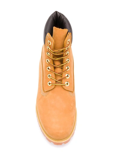 Shop Timberland Leather Lace-up Boots In Yellow