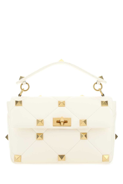 Shop Valentino Garavani Handbags. In White