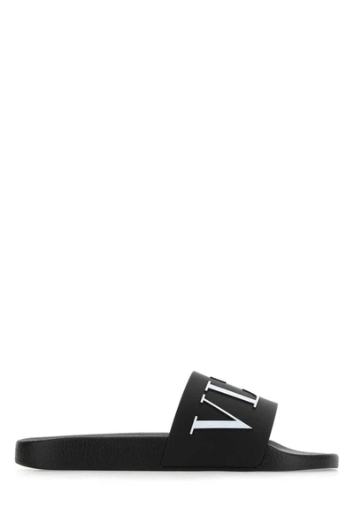 Shop Valentino Garavani Slippers In Black