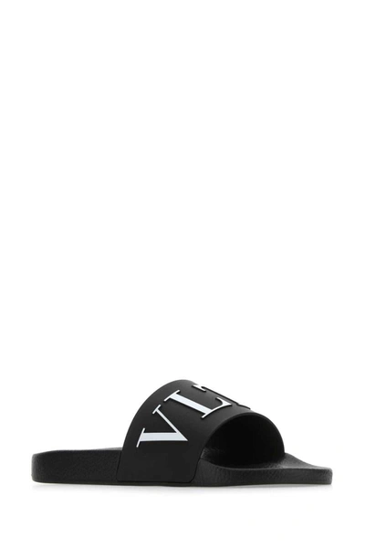 Shop Valentino Garavani Slippers In Black